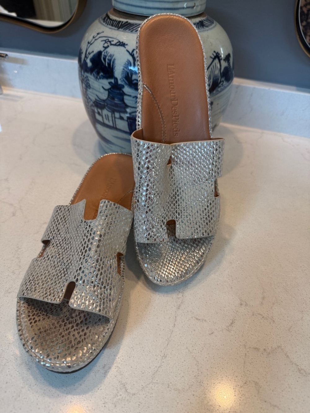 Metallic Silver Slide Sandals with Textured Upper and Open Toe